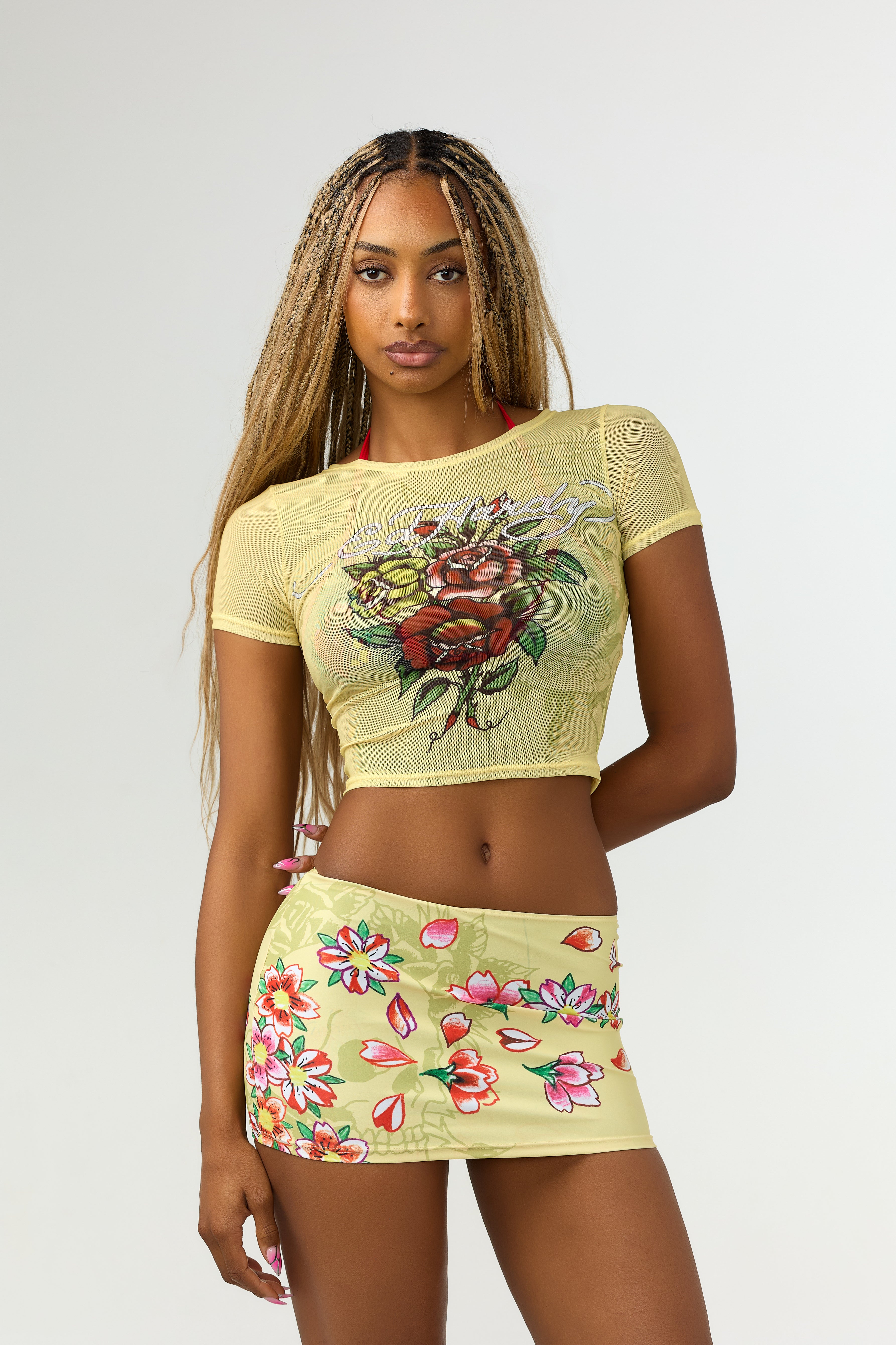 Woman wearing Ed Hardy Vintage Rose Swim Tee in yellow print