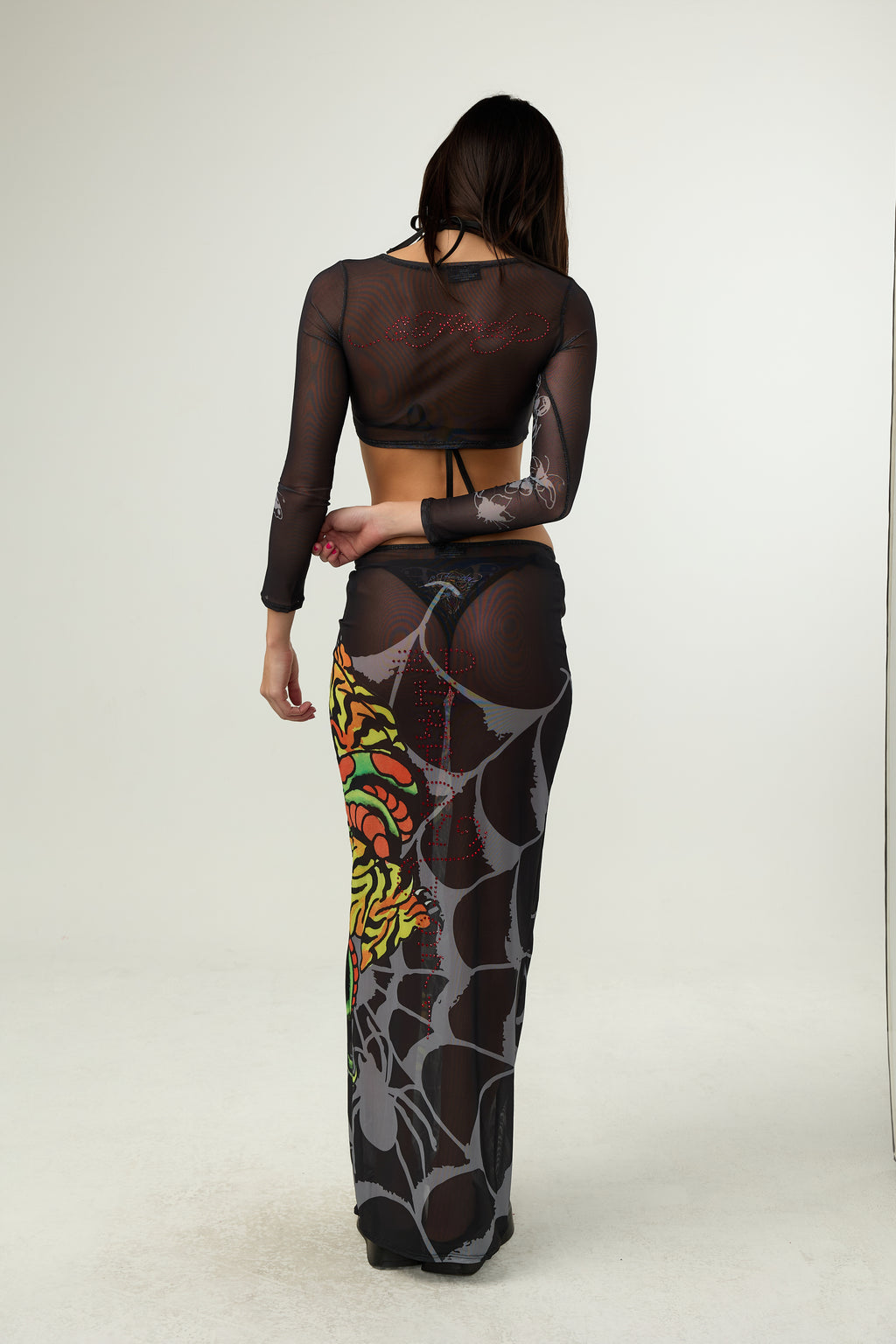 Woman wearing Ed Hardy Traditional Rose Swim Flare in black print