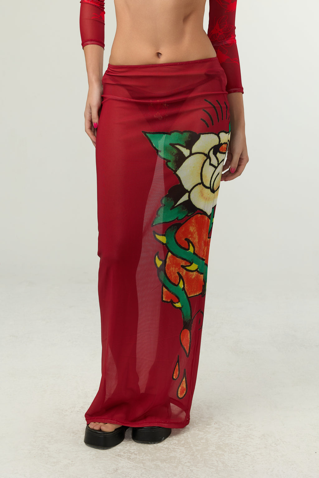 Close-up detail of Ed Hardy Rebel Rose Mesh Maxi Set in red print