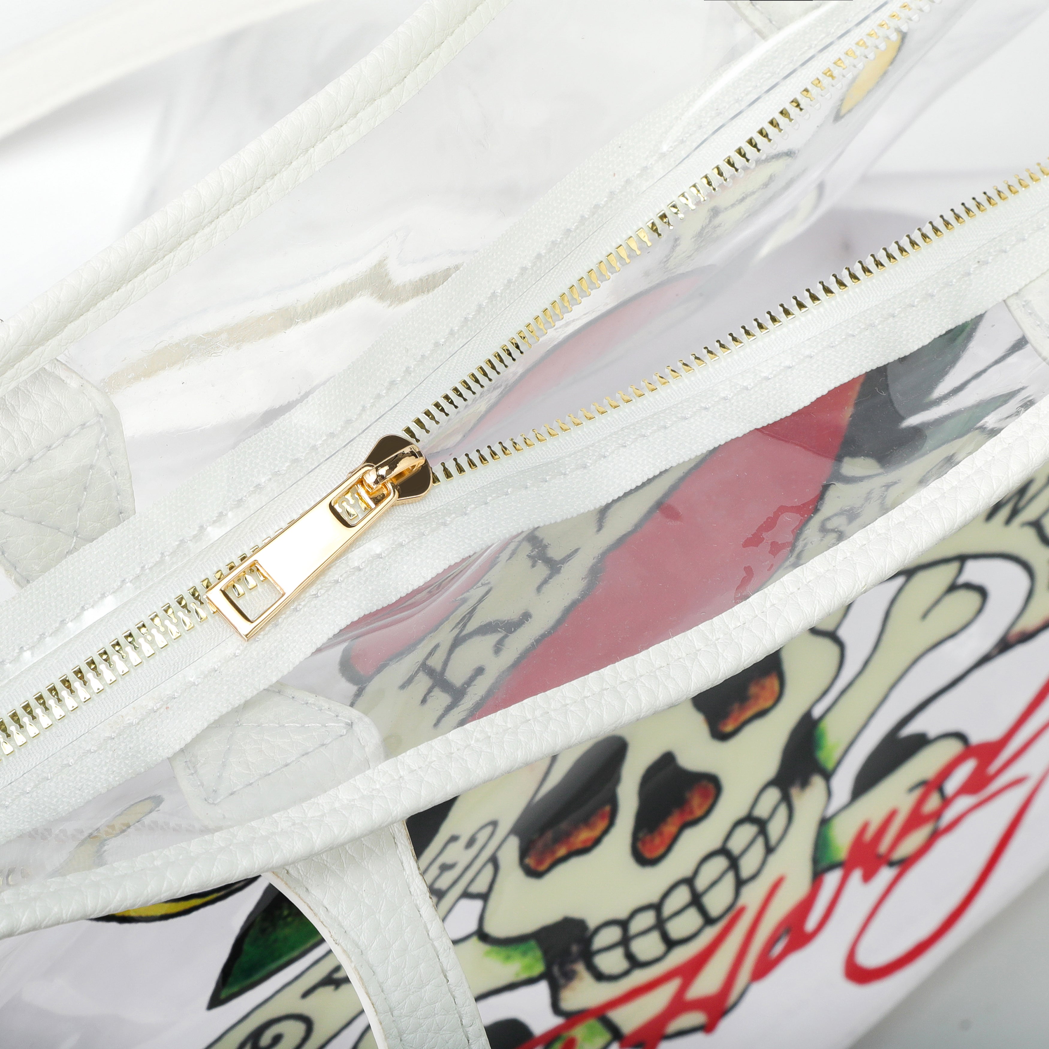 Close-up detail of Ed Hardy Ed Hardy Love Marry Kills Pvc Beach Tote Bag Clear in print