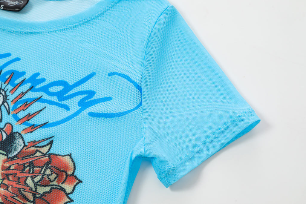 Close-up detail of Ed Hardy Sky Pantheress Swim Tee in light blue print