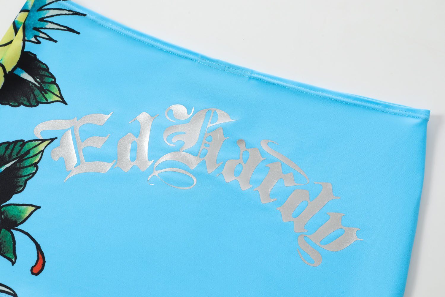 Close-up detail of Ed Hardy Sky Panthress Swim Skirt in light blue print