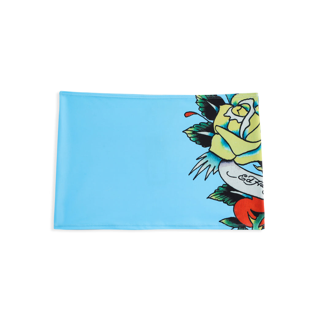 Close-up detail of Ed Hardy Sky Panthress Swim Skirt in light blue print