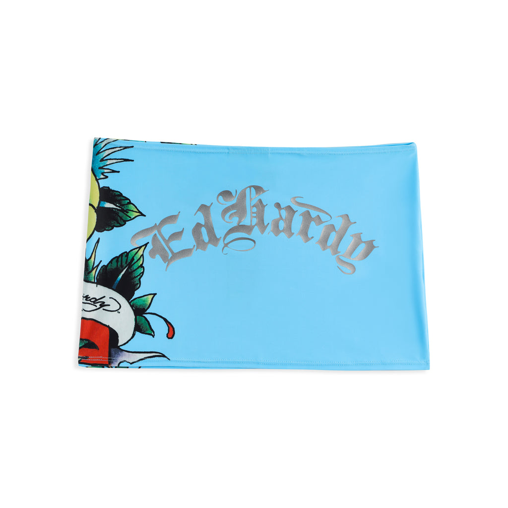 Close-up detail of Ed Hardy Sky Panthress Swim Skirt in light blue print