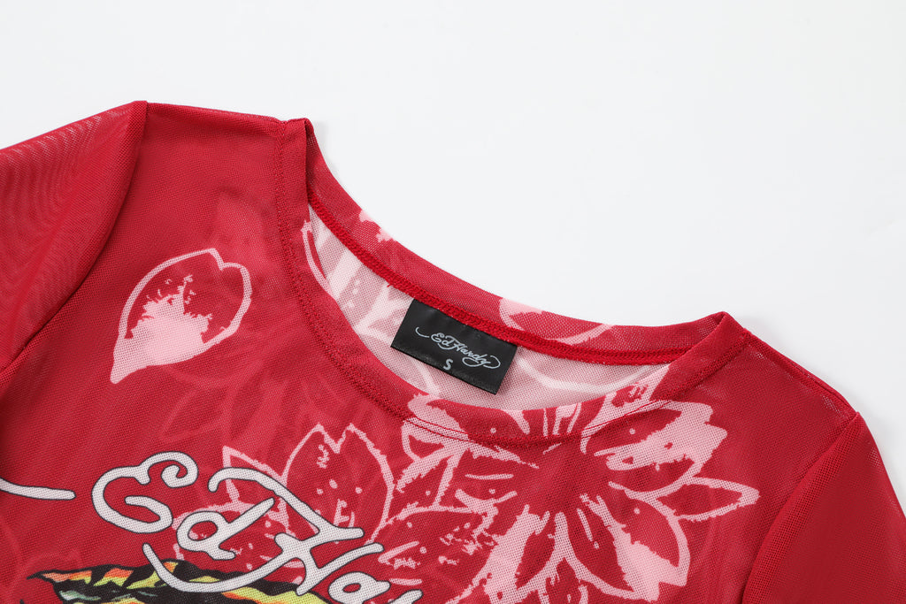 Close-up detail of Ed Hardy Crimson Tiger Swim Tee in red print