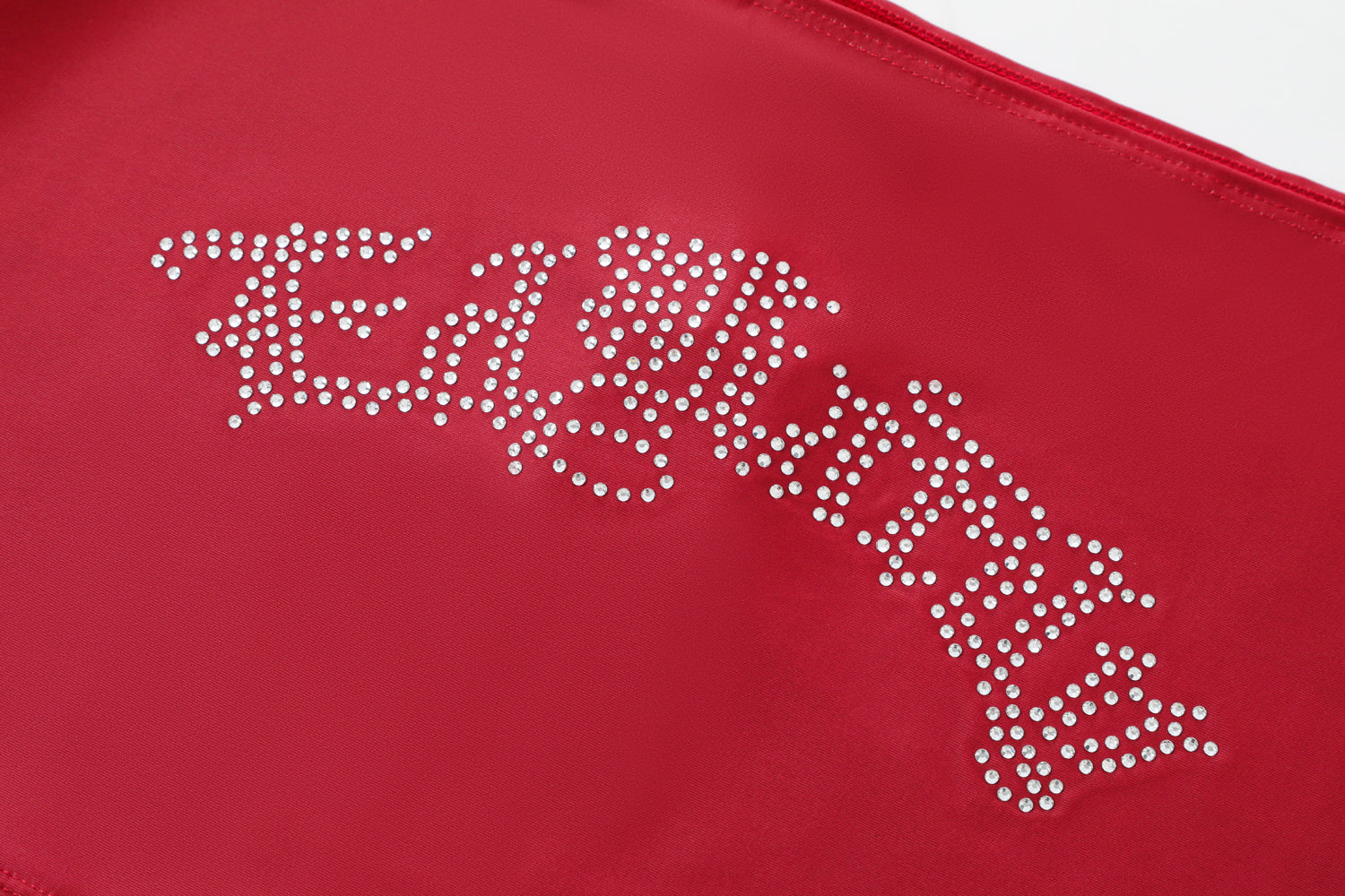Close-up detail of Ed Hardy Crimson Tiger Swim Skirt in red print