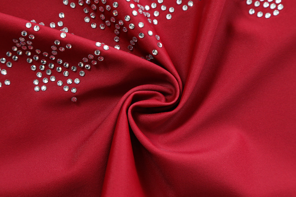 Close-up detail of Ed Hardy Crimson Tiger Swim Skirt in red print