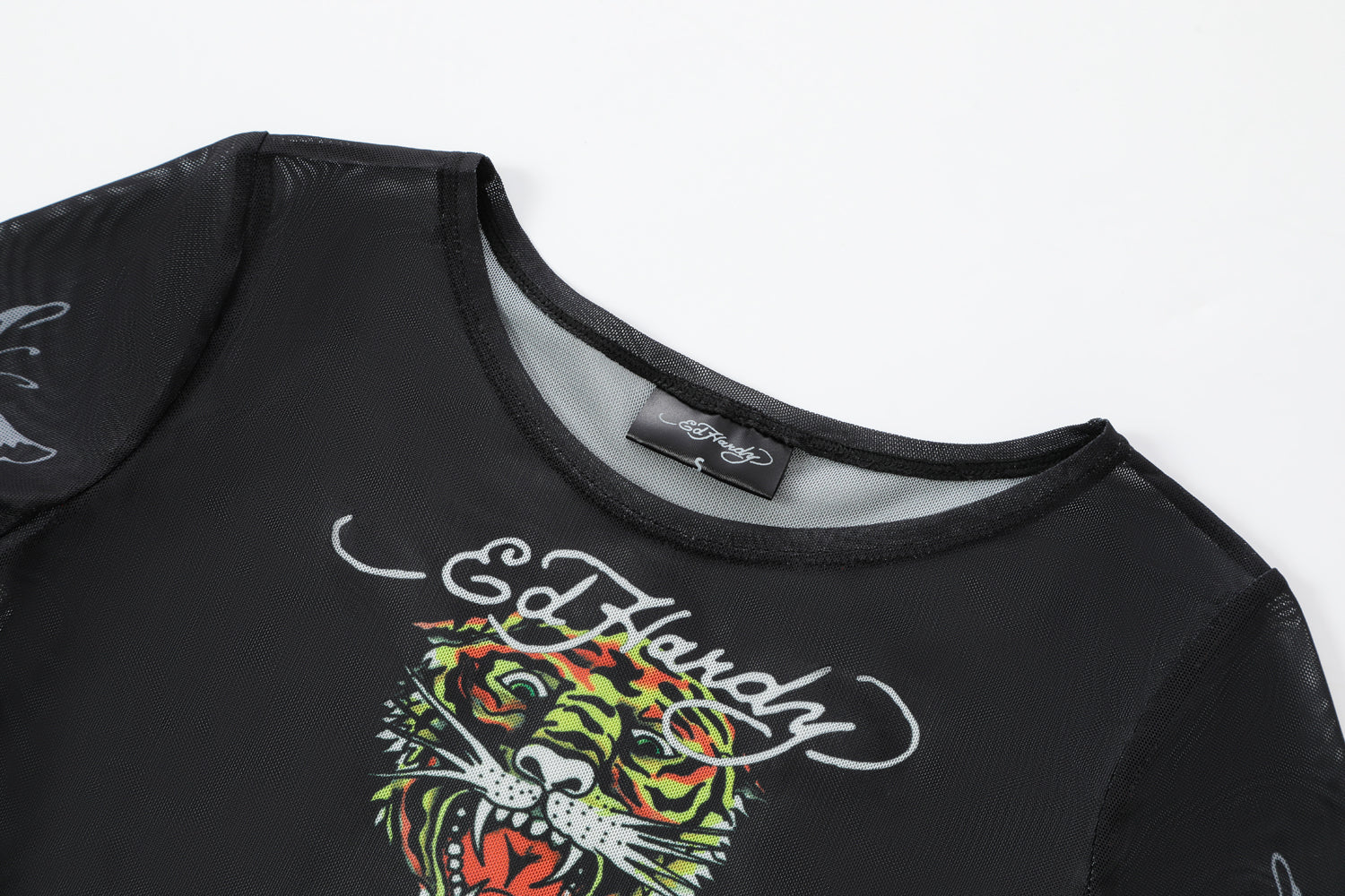 Close-up detail of Ed Hardy Glimmer Goth Mesh Maxi Set in black print