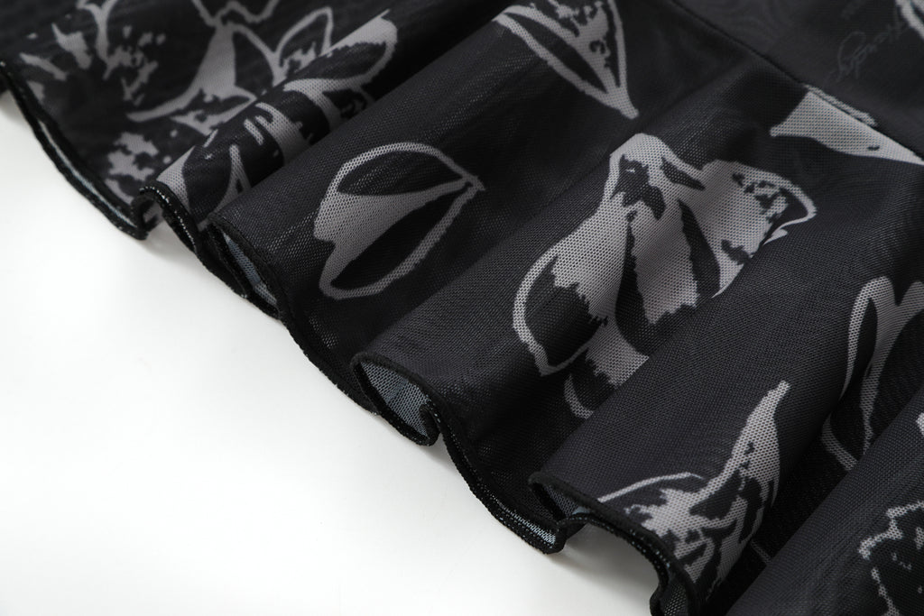 Close-up detail of Ed Hardy Night Angel Mesh Skirt in black print