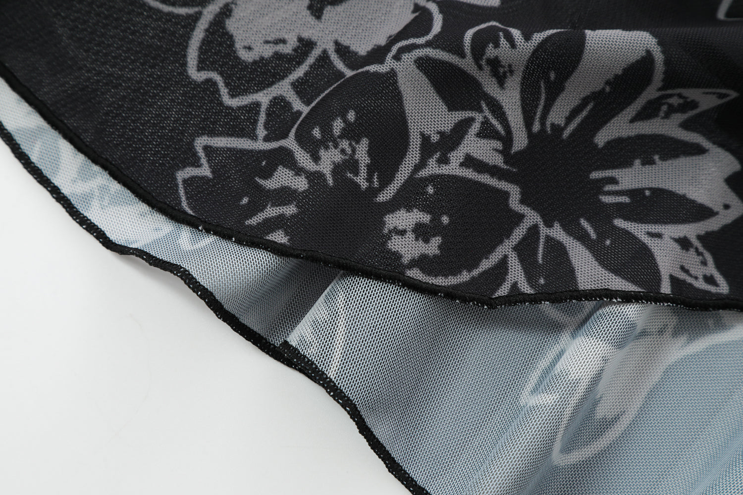 Close-up detail of Ed Hardy Night Angel Mesh Skirt in black print