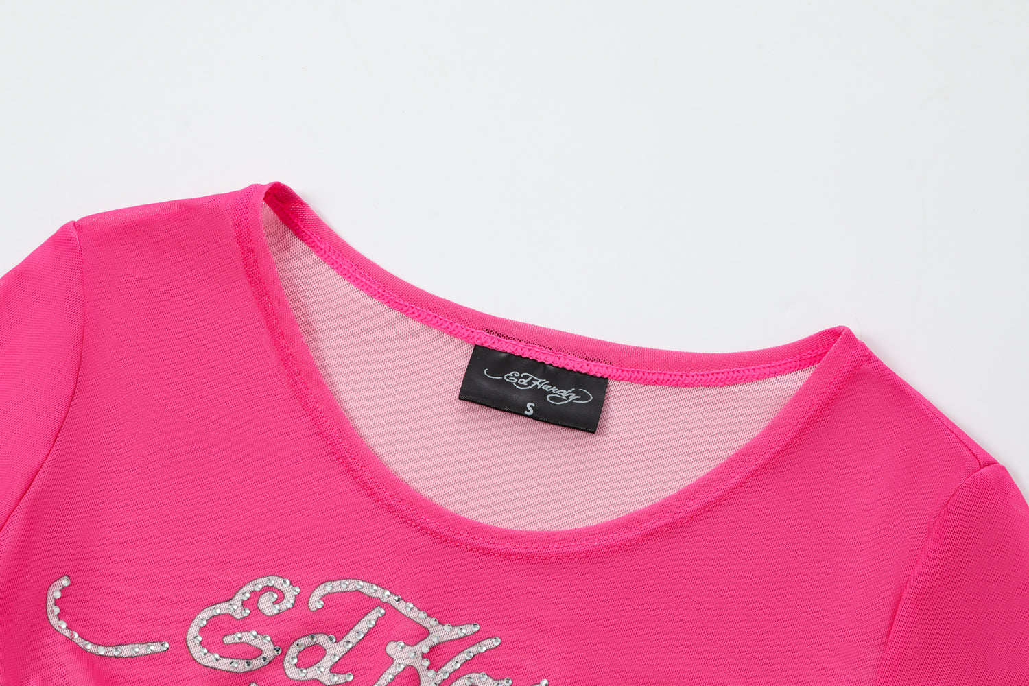 Close-up detail of Ed Hardy Pixie Cropped Mesh Longsleeve Cover Up in print