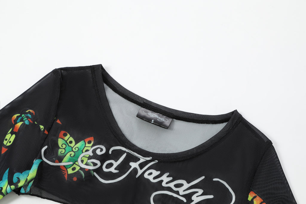 Close-up detail of Ed Hardy Midnight Cropped Mesh Longsleeve Cover Up in print