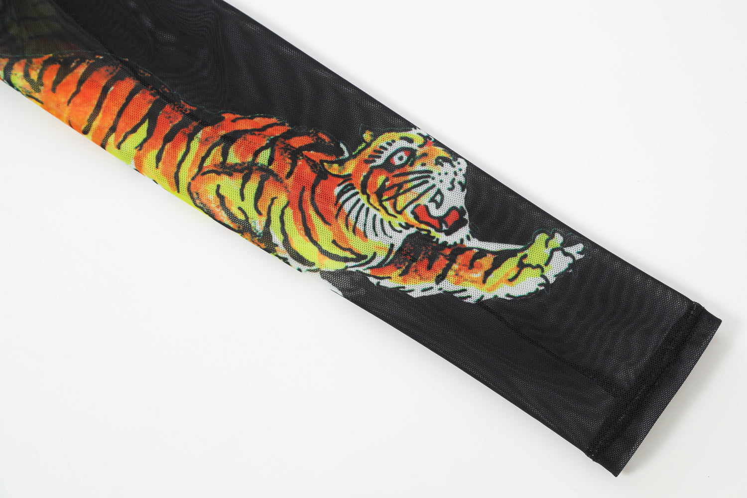 Close-up detail of Ed Hardy Midnight Cropped Mesh Longsleeve Cover Up in print