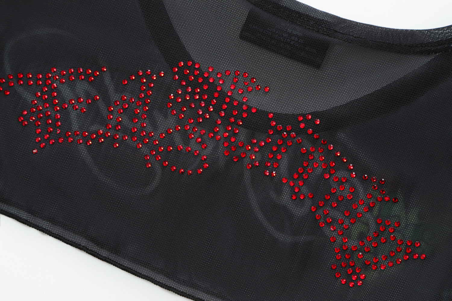 Close-up detail of Ed Hardy Midnight Cropped Mesh Longsleeve Cover Up in print