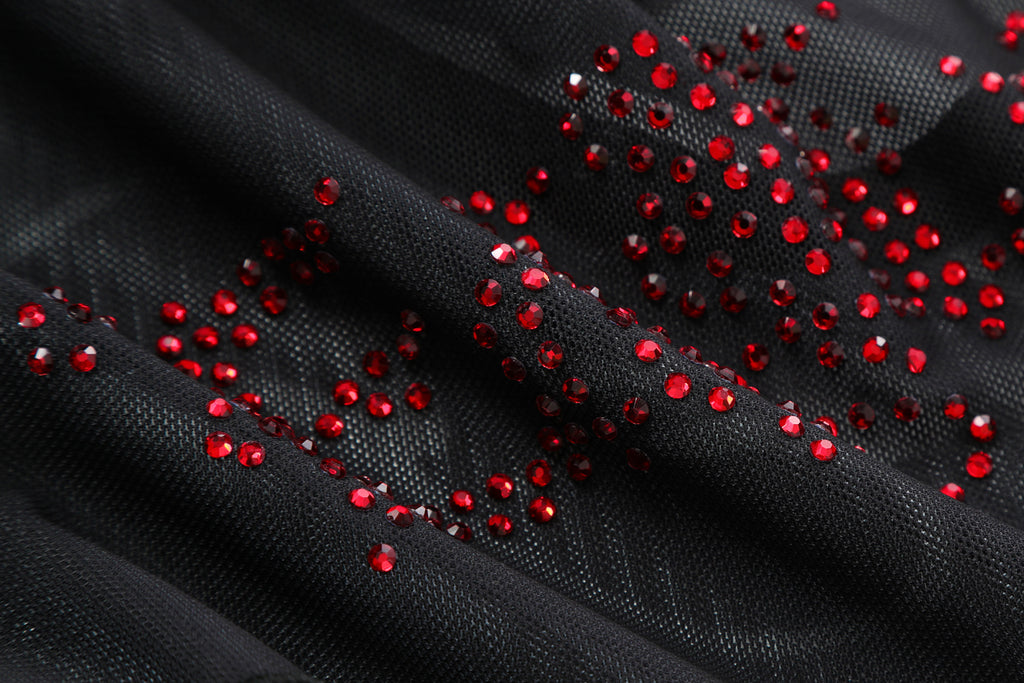 Close-up detail of Ed Hardy Midnight Cropped Mesh Longsleeve Cover Up in print