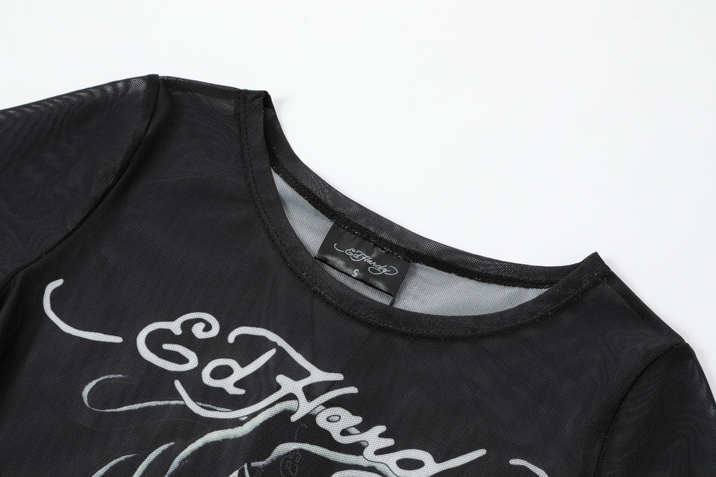 Close-up detail of Ed Hardy Venom Panther Swim Tee in black print