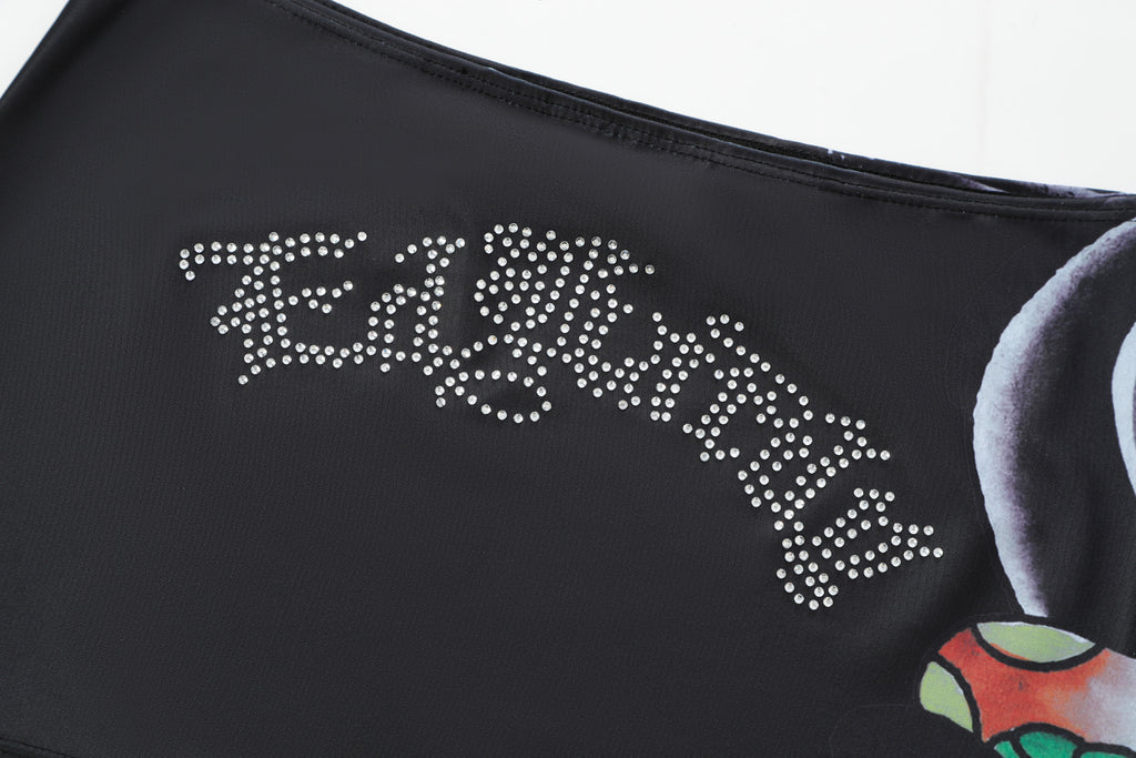 Close-up detail of Ed Hardy Vintage Rose Swim Skirt in black print