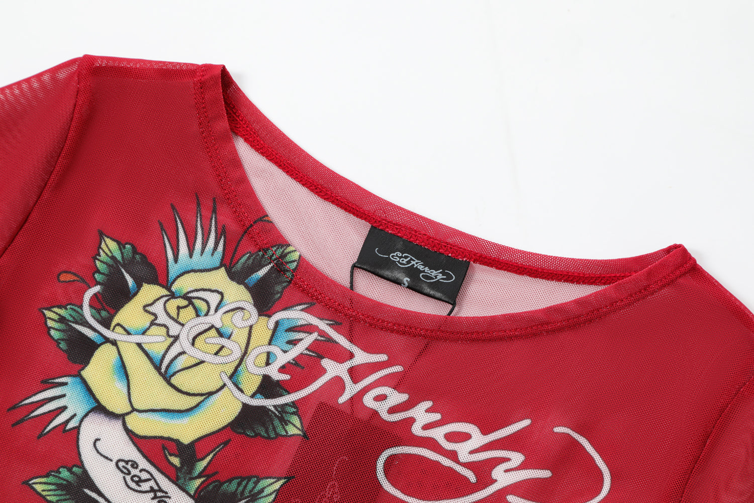 Close-up detail of Ed Hardy Rebel Rose Mesh Maxi Set in red print