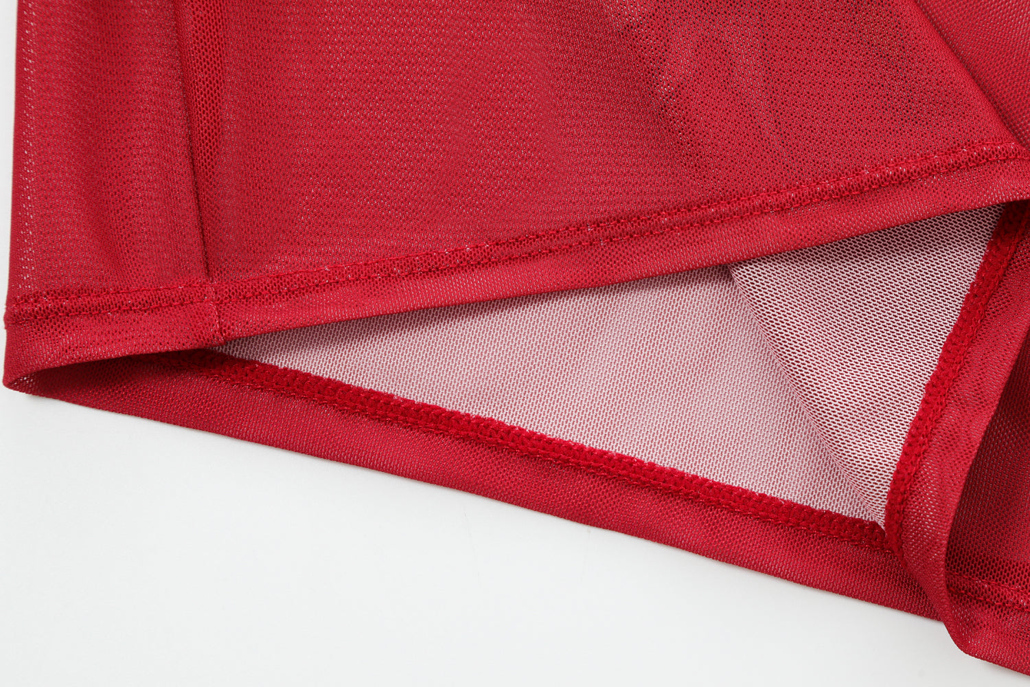 Close-up detail of Ed Hardy Rebel Rose Mesh Maxi Set in red print