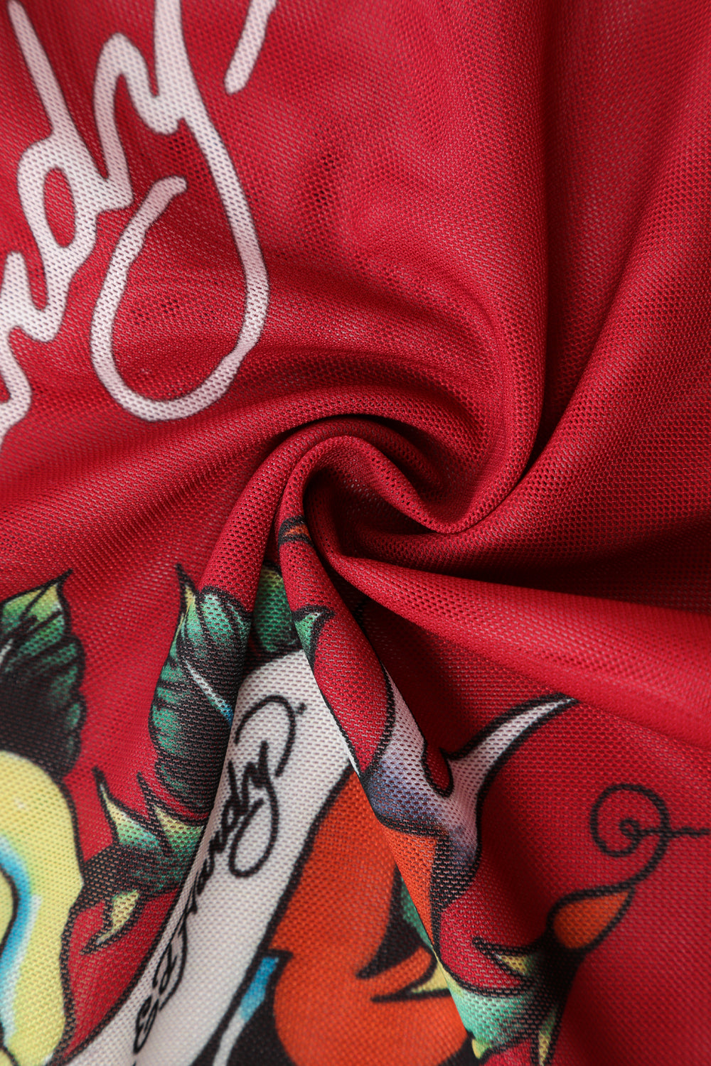 Close-up detail of Ed Hardy Rebel Rose Mesh Maxi Set in red print