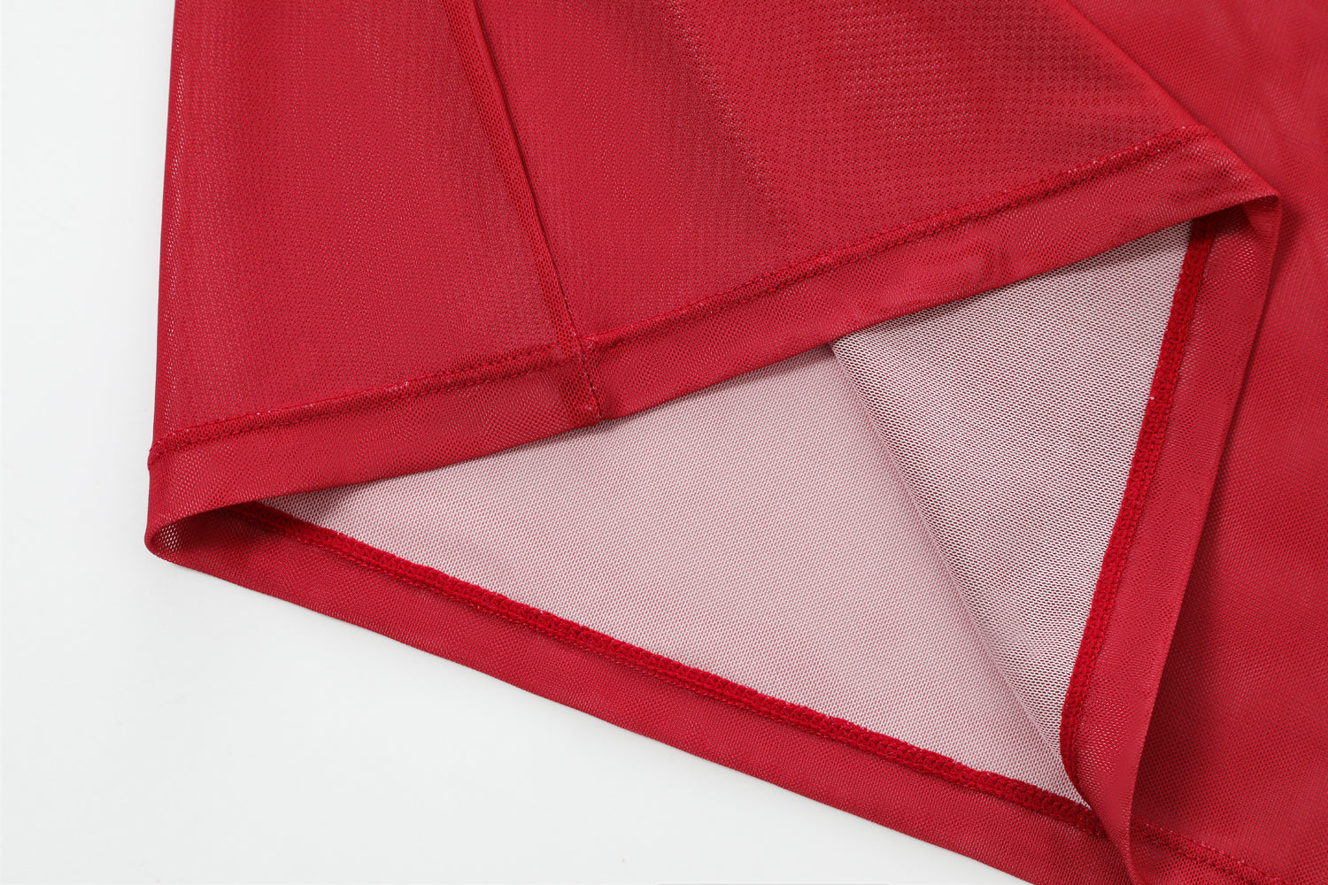 Close-up detail of Ed Hardy Rebel Rose Mesh Maxi Set in red print