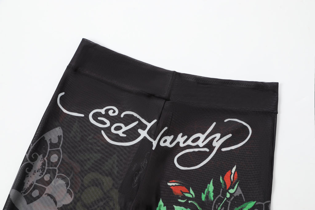 Close-up detail of Ed Hardy Traditional Rose Swim Flare in black print