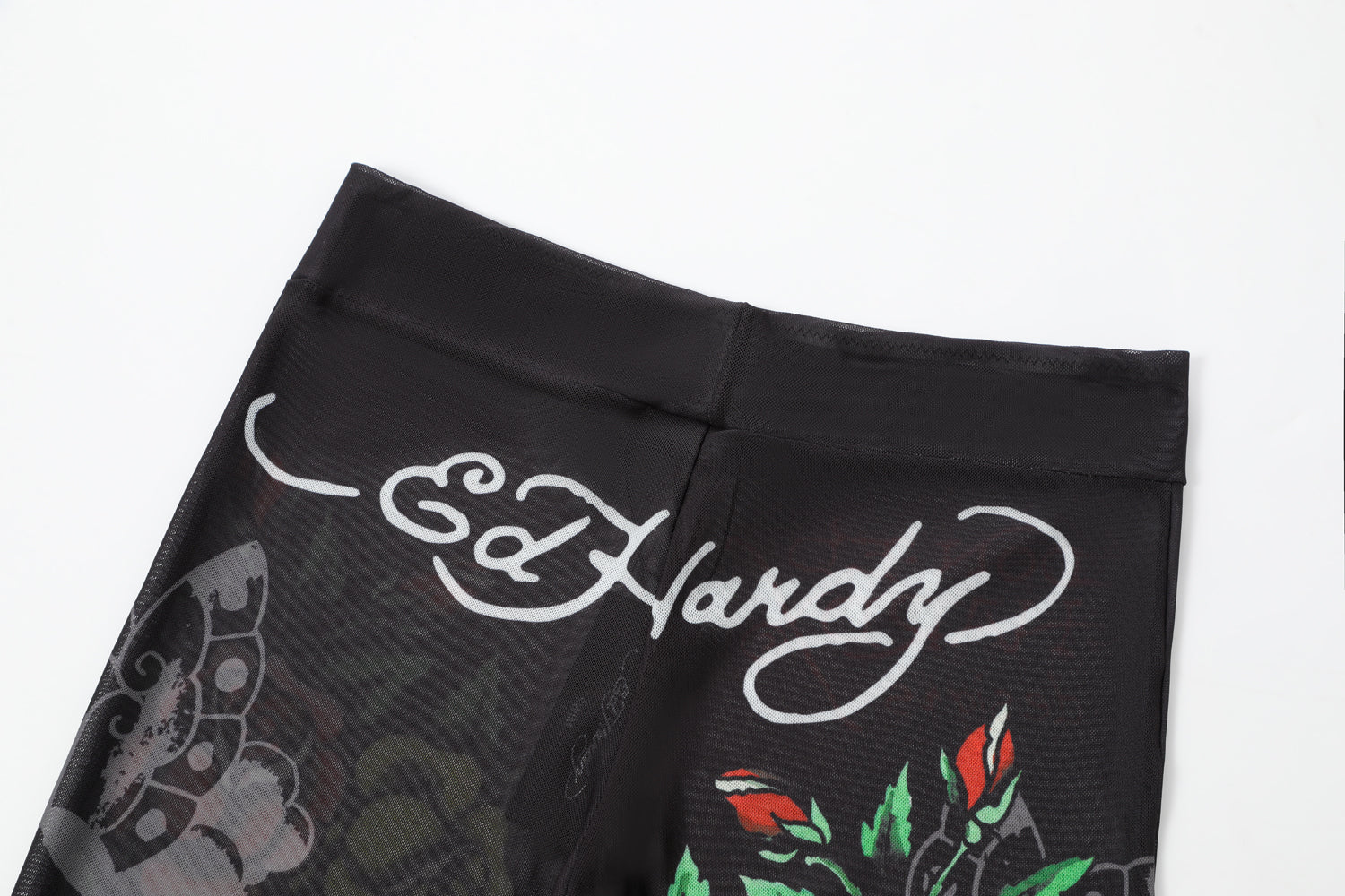 Close-up detail of Ed Hardy Traditional Rose Swim Flare in black print