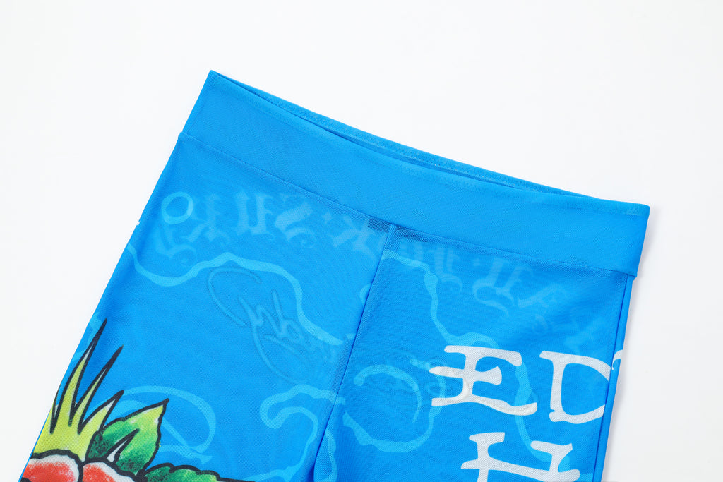 Close-up detail of Ed Hardy Sapphire Siren Swim Flare in blue print