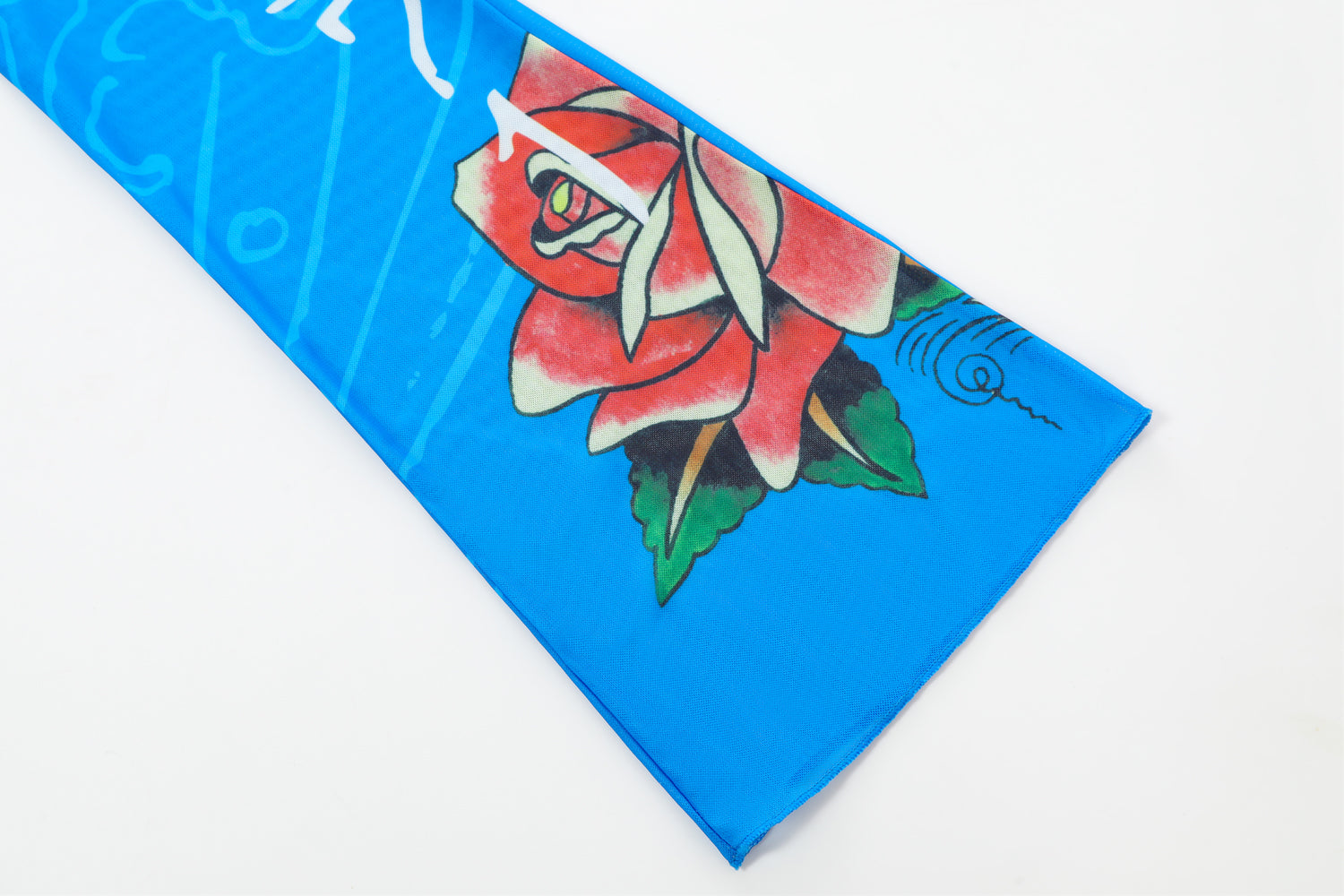 Close-up detail of Ed Hardy Sapphire Siren Swim Flare in blue print
