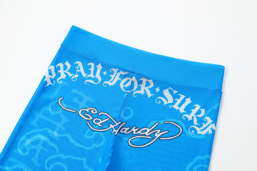 Close-up detail of Ed Hardy Sapphire Siren Swim Flare in blue print