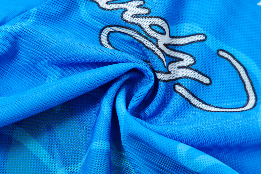 Close-up detail of Ed Hardy Sapphire Siren Swim Flare in blue print